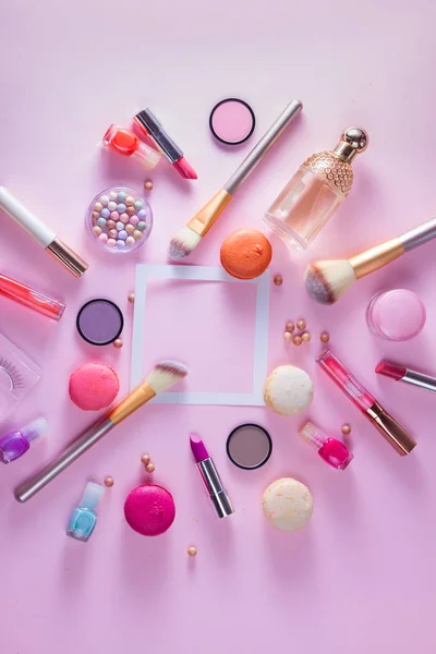 depositphotos_183770976-stock-photo-make-up-products-and-macaroons
